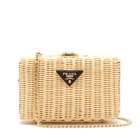 prada woven rattan clutch|Prada leather clutches.